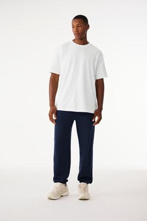 FLG Lacrosse Navy BELLA+CANVAS Unisex Sponge Fleece Sweatpant, with the Long Island Lacrosse Stick Circle — Carolina & White design, on the left leg logo, front view